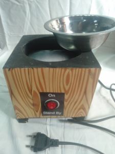 KOMPOR LISTRIK BATIK KAYU dengan pengatur suhu dan pemanas terpisah.