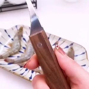 Durable Stainless Steel Seafood Peeler Tool for Fast Shrimp Shell Removal in the Kitchen