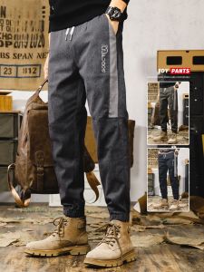 ROMON | Quần dài công sở nam mùa xuân thu mới thời trang quần dài rộng rãi co giãn cạp chun phong cách Harajuku quần dài thường ngày