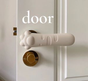 SZS ฝาครอบป้องกันมือจับประตูซิลิโคนอุ้งเท้าแมวน่ารักสำหรับเด็กกันการชนป้องกันไฟฟ้าสถิตย์