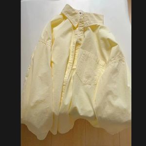 เสื้อเชิ้ตผู้หญิงคอโปโลแขนยาวทรงหลวมสไตล์ลำลอง ผ้าฝ้ายแท้สีเหลืองหวาน สไตล์ฤดูใบไม้ผลิและฤดูใบไม้ร่วง ดีไซน์ใหม่