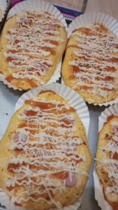 CUP ROTI OVAL MOTIF KINCIR ISI 200 PCS