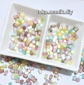 20gram manik tabung cat eye glass beads manik kaca