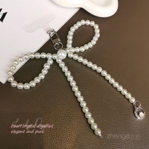 สร้อยคอโทรศัพท์มือถือแบบมีปุ่มห้อยรูปผีเสื้อติดกระเป๋าสุดเก๋ไก๋ สร้อยคอรถยนต์ จี้กุญแจ จี้มือถือสำหรับผู้หญิง ทนทานและแข็งแรง