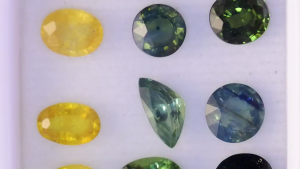 ชุดพลอยไพลินธรรมชาติ สีเขียวอมฟ้า(ทีล) เขียว และเหลือง สำหรับงานสั่งทำจิวเวลรี่ - เจียระไนทรงกลม ทรงรี และทรงหยดน้ำ รวม 9 เม็ด 5.69 กะรัต