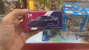 Mô Hình Xe Diecast 1/64 Porsche Taycan Turbo GT (Purple) - Chính Hãng Trends Hobby