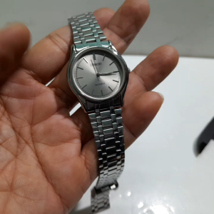Đồng hồ nam tay nhỏ dây thép Current size 33mm second hand si Nhật