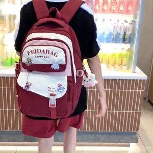 KNT กระเป๋าเป้สะพายหลังทูโทน รุ่น TB9080 สีน่ารัก แถมฟรี พวงกุญแจหมีและเซตเข็มกลัด 4 สี