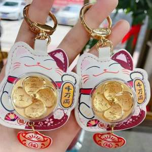 Chow Tai Fooks Fortune Cat key chain gold foil ro周大福风生水起招财猫钥匙扣金箔旋转风车皮革包包挂饰礼物
