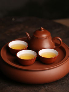 Traditional Gold And Jade Smooth Gongfu Tea Cup High Temperature Porcelain Underglaze Red Clay Black Clay Spiral Small Cup Wine Cup