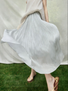 SUSHE | Flowing Pleated High Waist Midi Skirt