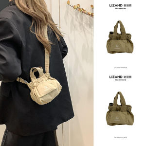 กระเป๋าสะพายไหล่ผ้าใบขนาดเล็กสำหรับผู้หญิง ฤดูใบไม้ร่วง/ฤดูหนาว ดีไซน์ใหม่ 2025 กระเป๋าถือแบบสะพายข้างแบบลำลอง