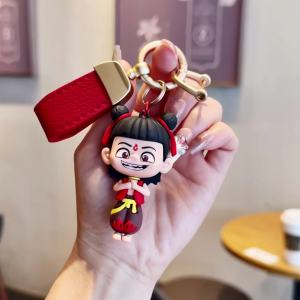 适用新款哪吒2魔童闹海周边哪吒敖丙硅胶立体爱玛电动车钥匙套扣Suitable for the new Nezha 2 Magic Childrens Sea of Troubles Nezha Ao Bing Silicone Three Dimensional Emma Electric Car Keychain