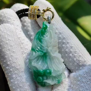 Natural Type A Jadeite carved as cabbage with ruyi - NGI Certification  Weight 83.45 g  Translucent with faint green and green patches   [45.47 * 25.39 * 9.31 mm]  Premium Myanmar Jadeite Pendant (pendant150)