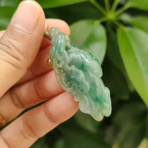 Green with Yellow Natural Type A Jadeite Jade crafted with Ruyi and Pixiu as pendant certificate weighs 16.67 grams measurement 47.2 * 19.8 * 13.3 mm (pendant344)