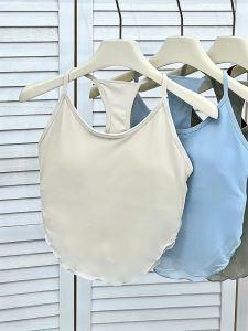 เสื้อกั๊กโยคะผ้าตาข่ายน้ำหนักเบาสำหรับผู้หญิง เสื้อออกกำลังกาย Pilates ดีไซน์หลังสวยงาม เสื้อผ้าออกกำลังกายแบบมีแผ่นเสริมหน้าอก