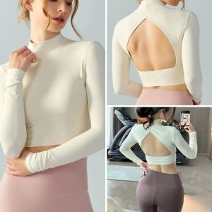 เสื้อโยคะผู้หญิงแขนยาวสไตล์อเมริกันเซ็กซี่สำหรับการออกกำลังกาย Pilates โยคะ ฟิตเนส ป้องกันการสั่นสะเทือน ชุดโยคะ