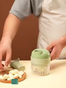 4-in-1 Handheld Electric Vegetable Cutter - Chop Slice Dice and Mince with Ease