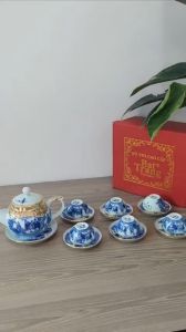 Bộ ấm chén bọc đồng Bát Tràng men lam 16 món vẽ cảnh tiêu dao hàng loại 1 do nghệ nhân chế tác full hộp đẹp (Hàng Vip)