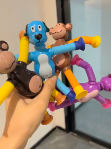 [SG Stock]Sucker Changeable Monkey Luminous Cartoon Retractable Kids Baby Puzzle Matching Interactive Pull Tube Decompression Toy