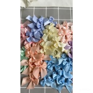 โบว์จิ๋ว เลือกสีตามใจชอบหรือคละสี หน้ากว้าง 12-13 มม.แพ็คละ 20/50/100 ชิ้น โบว์ติดของชำร่วย(อ่านรายละเอียดก่อนสั่ง)