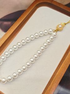 สร้อยคอโทรศัพท์มือถือปEARL กระเป๋าเงินสีทอง สร้อยคอกล้องป้องกันการสูญหาย เครื่องประดับแขน โซ่โทรศัพท์มือถือ ของขวัญวันเกิด