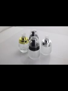 30ml Refillable 1oz Vacuum Frosted Glass Bottle for Makeup Face Cream Lotion and Ointments - Travel-Friendly with Pump and Ca
