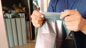 PLASTIK MULSA KILOAN HITAM PERAK KUAT ULET TAHAN SEGALA CUACA