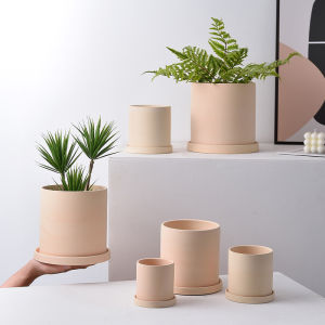 กระถางระบายอากาศแบบเรียบง่ายสไตล์นอร์ดิกกระถางดอกไม้ทรงกลมมีรูแบบเซรามิกกระถางดินเผาพืชอวบน้ําล้างสต๊อกราคาพิเศษ