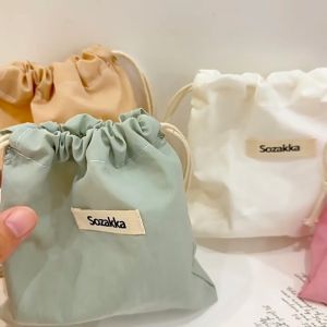 ชิ้นเล็ก กระเป๋าเก็บเครื่องสำอาง ผ้า ถุงหูรูด กระเป๋าเก็บวัตถุ กระเป๋าใส่เหรียญ