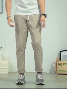 NEW WESTERN Casual pants mens 2023 summer thin loose straight nine-point tide brand tooling tapered boys long pants