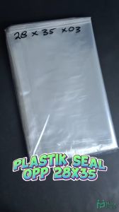 Plastik Seal OPP 28x35x03 (100 lembar) / Plastik Lem 28 x 35 x 03 Bening Rekat Kaos Baju Kemeja Celana