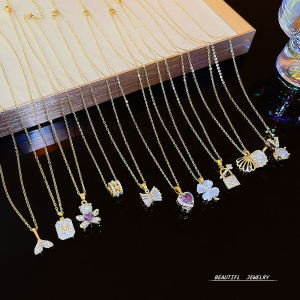 แฟชั่นการออกแบบอเนกประสงค์ระดับไฮเอนด์ควอตซ์ประดับสร้อยคอสําหรับผู้หญิงไทเทเนียมเหล็กข้ามโซ่รูปแบบเรขาคณิต