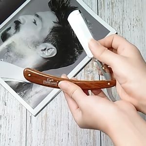 TOKAI มีดโกนหนวด สแตนเลสไม่เป็นสนิม พับได้ ขนาดใบมีด 6.3 ซม. รุ่น 77 ด้ามไม้ ยาว 17 ซม. หมุดทองเหลือง แข็งแรงทนทาน ใช้งานยาวนาน โกนหนวด กันจอน