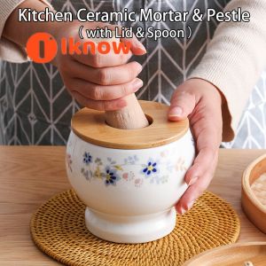 I know Kitchen Ceramic Mortar and Pestle Set Spice Herb Garlic Crusher Guacamole Bowl with Lid Spoon Grinding and crushing machine
