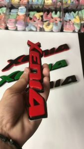 EMBLEM MOBIL XENIA VARIASI MOBIL DAIHATSU DENGAN HURUF TIMBUL 3D BAHAN FIBERGLASS