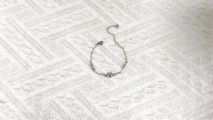 Sanrio | Silver Tone My Melody Charm Bracelet Zinc Alloy with Bow & Heart Details Adjustable Chain with My Melody Logo Tag