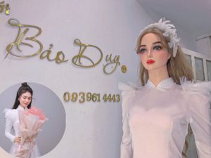 Áo dài lụa tay phồng lông vũ trắng siêu xinh