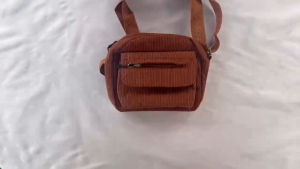 CJY SHOP#4068 Fashion Women`s casual corduroy crossbody sling bag designed with an adjustable canvas shoulder strap.