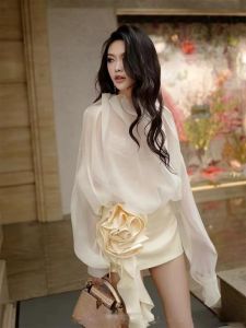 Elegant Korean-style Sheer Blouse with Floral Skirt Set