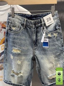 LIIEN NOOS | Ripped Aged Denim Shorts