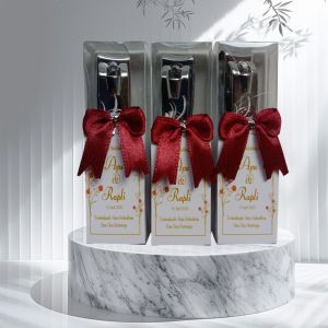 Isi  50 Pcs - Souvenir Gunting Kuku 777 Ukuran Besar Kemas Mika dan Hiasan Pita Cantik