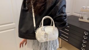 Túi Xách Nữ Đeo Chéo Da PU Nổi Bật với Nơ Thả Ngọc Trai - Thiết Kế Thời Trang Đa Năng Sang Trọng