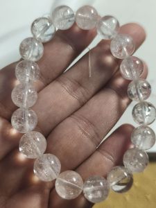 LITTLE D HERKIMER NATURAL CRYSTAL BRACELETS clear hexagonal beads with natural inclusions on wrist
