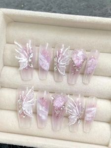 สติ๊กเกอร์ติดเล็บคริสตัลนางฟ้าผีเสื้อแฮนด์เมดบริสุทธิ์สําหรับการดูแลเล็บมืออาชีพและแฟชั่นแพทช์เล็บสีขาวหรูหราน้ําหนักเบา