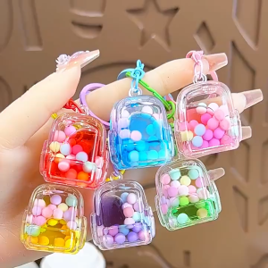 Creative Cartoon Keychain Bag Exquisite Pendant Liquid Quicksand Bottle Colorful Bead Gift wholesale notebook school supplies