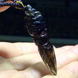 Pure natural black crystal demon-repelling staff pendant. This item is usually used for warding off evil spirits and possesses powerful magic power. Specifications: 45.5 * 12 millimeters