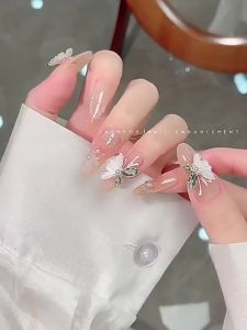 Pengaturan Dekorasi Kupu-kupu Kristal Berlian & Aksesoris Seni Kuku\r\n\r\nSelamat datang di artikel ini tentang pengaturan dekorasi kupu-kupu kristal berlian dan aksesoris seni kuku. Kami akan membahas fitur produk, cara menggunakan dekorasi kuku, dan keunggulan produk.\r\n\r\n Fitur Produk\r\n\r\n Kupu-kupu Kristal\r\nProduk ini menawarkan hiasan kupu-kupu kristal yang cantik dan indah, yang dapat memperindah kuku Anda. Kupu-kupu ini memiliki kilau yang memukau dan membuatnya menjadi pilihan yang sempurna untuk dekorasi kuku Anda.\r\n\r\n Berkualitas Tinggi\r\nKami menawarkan aksesori yang terbuat dari logam berkualitas tinggi yang kokoh dan tahan lama. Dengan bahan ini, Anda dapat yakin bahwa dekorasi kuku Anda akan bertahan lama dan tidak mudah rusak.\r\n\r\n Kelas Atas\r\nProduk ini dirancang untuk memberikan penampilan yang mewah dan elegan. Dengan menggunakan aksesori ini, Anda dapat menunjukkan gaya Anda yang unik dan menarik perhatian orang lain.\r\n\r\n Cara Menggunakan Dekorasi Kuku\r\n\r\n Menempelkan Hiasan Kuku\r\nUntuk menempelkan hiasan kuku, pastikan kuku Anda bersih dan kering. Gunakan lem khusus untuk menempelkan hiasan pada kuku Anda.\r\n\r\n Mengaplikasikan Kupu-kupu Kristal\r\nSetelah menempelkan hiasan kuku, aplikasikan kupu-kupu kristal pada bagian yang diinginkan. Pastikan untuk mengaplikasikan dengan hati-hati agar hasilnya tetap rapi dan indah.\r\n\r\n Menyempurnakan Seni Kuku\r\nSetelah selesai mengaplikasikan kupu-kupu kristal, Anda dapat menambahkan sentuhan akhir dengan cat kuku atau glitter. Ini akan memberikan tampilan yang lebih menarik dan unik pada kuku Anda.\r\n\r\n Keunggulan Produk\r\n\r\n Bahan Logam\r\nProduk ini terbuat dari logam berkualitas tinggi yang tahan lama dan kokoh. Dengan bahan ini, Anda dapat yakin bahwa dekorasi kuku Anda akan bertahan lama dan tidak mudah rusak.\r\n\r\n Ukuran Produk: 1,4 x 1,2 x 1cm\r\nProduk ini memiliki ukuran yang pas untuk ditempelkan pada kuku Anda. Ukuran ini memastikan bahwa hiasan kuku Anda akan terlihat proporsional dan tidak terlalu besar atau terlalu kecil.\r\n\r\n Tahan Lama dan Kokoh\r\nProduk ini dirancang untuk bertahan lama dan tidak mudah rusak. Dengan bahan berkualitas tinggi dan ukuran yang tepat, Anda dapat yakin bahwa dekorasi kuku Anda akan tetap menarik dan indah dalam jangka waktu yang lama.\r\n\r\nDengan fitur-fitur tersebut, Anda dapat yakin bahwa dekorasi kupu-kupu kristal berlian dan aksesoris seni kuku ini adalah pilihan yang sempurna untuk menambahkan sentuhan akhir pada penampilan Anda. Selain itu, produk ini juga cocok digunakan sebagai hadiah unik dan menarik untuk orang-orang yang Anda cintai.\r\n\r\n**Kata kunci yang digunakan:** Hiasan Kuku Butterfly Rhinestone, Dekorasi Nail Art Metal, Dekorasi Kuku Kupu-kupu Kristal, Aksesoris Seni Kuku Berlian, Dekorasi Kuku untuk Nail Art\"\r\n}