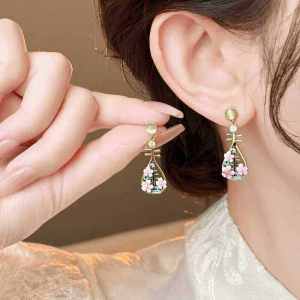 Womens New Chinese Style Hollow Carving Pipa Earrings Ancient Wind Design Drip Glaze Flower Dangle Earrings Hanfu Cheongsam