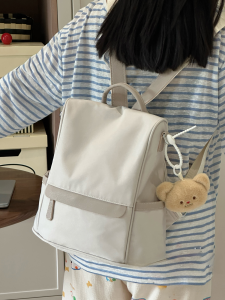 กระเป๋าเดินทางน้ําหนักเบาสไตล์ญี่ปุ่นสําหรับผู้หญิงขนาดกะทัดรัดลําลองอเนกประสงค์เดินทางกระเป๋าเป้สะพายหลังนักเรียนซับโพลีเอสเตอร์ป้องกันการสาดกันน้ํา